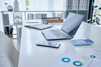 Buy stock photo Closeup shot of a laptop on a desk in an empty office