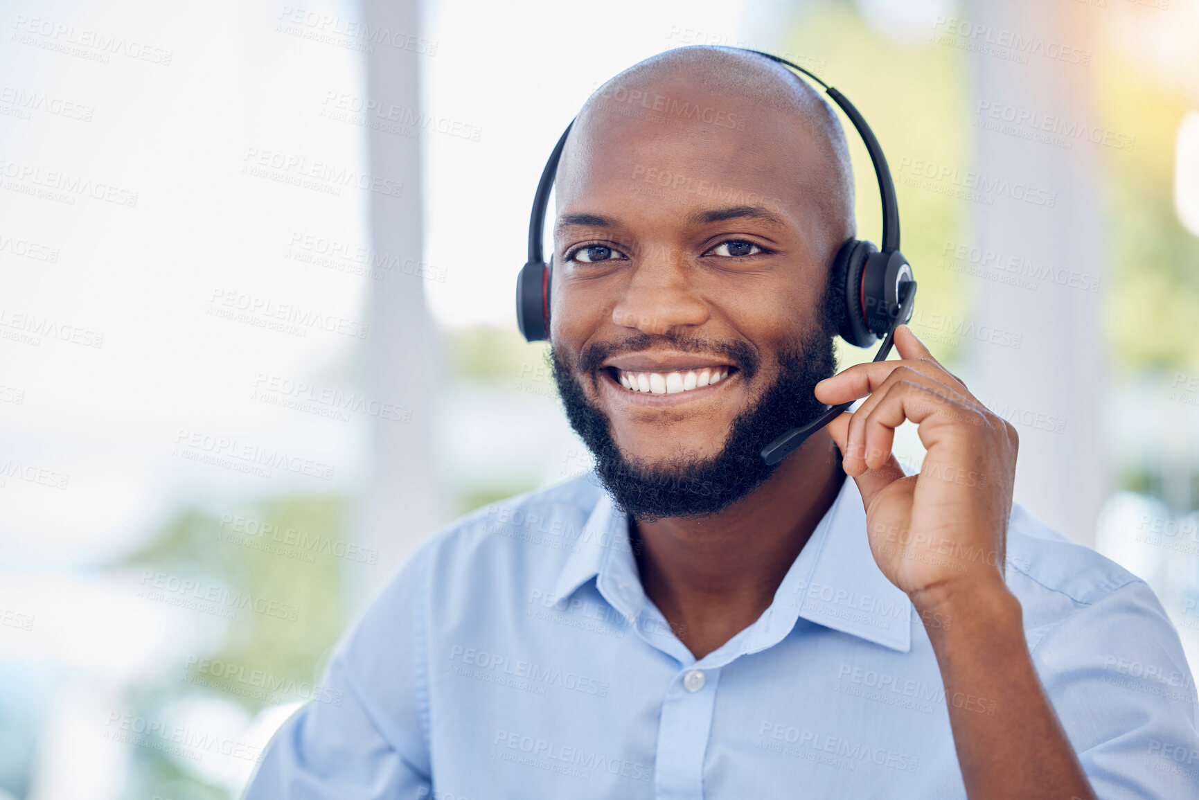 Buy stock photo Black man, portrait and callcenter with phone call and contact us, communication with headset and CRM. Male consultant with smile, customer service or telemarketing with tech support and help desk