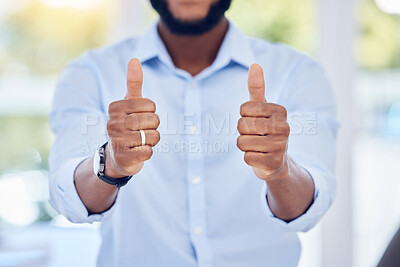 Buy stock photo Shot of an unrecognizable businessperson showing two thumbs up at work