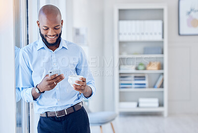 Buy stock photo Shot of a young businessman using a phone at work