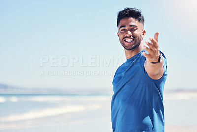Buy stock photo Shot of a fit young man out for a workout on the beach