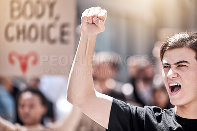 Buy stock photo Protest, rally and man with fist raised for freedom, human rights or equality outdoor in city. Speaker with community people hands, poster or sign to shout for politics, change or reproductive choice