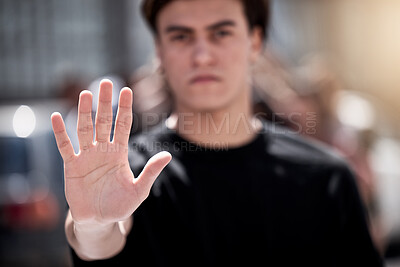 Buy stock photo Portrait, hand and man in rally with stop, decision making and choice with gesture for peace. Serious, male protester or activist with prohibition sign for justice, voice and human rights in protest