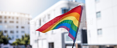 Buy stock photo Shot of LGBTQ flag being flown during a protest