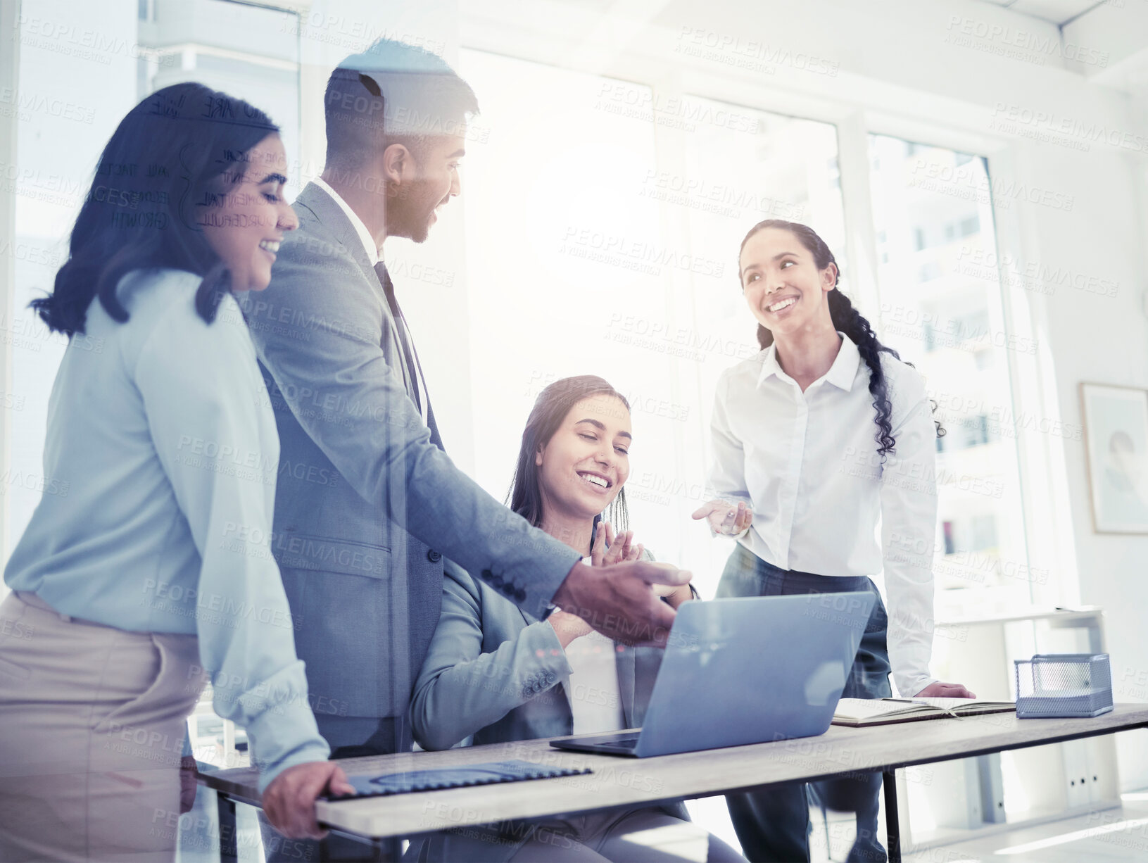 Buy stock photo Shot of a group of businesspeople working together on a laptop in an office