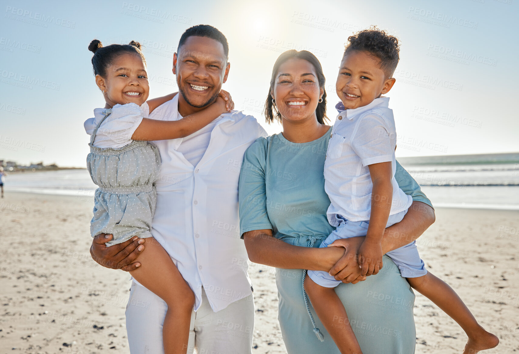 Buy stock photo Smile, beach and portrait of parents with kids for bonding on summer holiday, vacation and weekend by ocean. Happy, family and mom, dad and children for relationship, adventure and relax outdoors