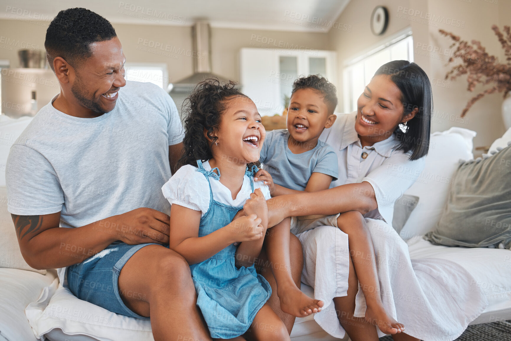 Buy stock photo Portrait, love and children laughing with happy family or house to relax with security, safety and care. Smile, boy or proud parents on sofa with kid, support and trust for bonding together in home