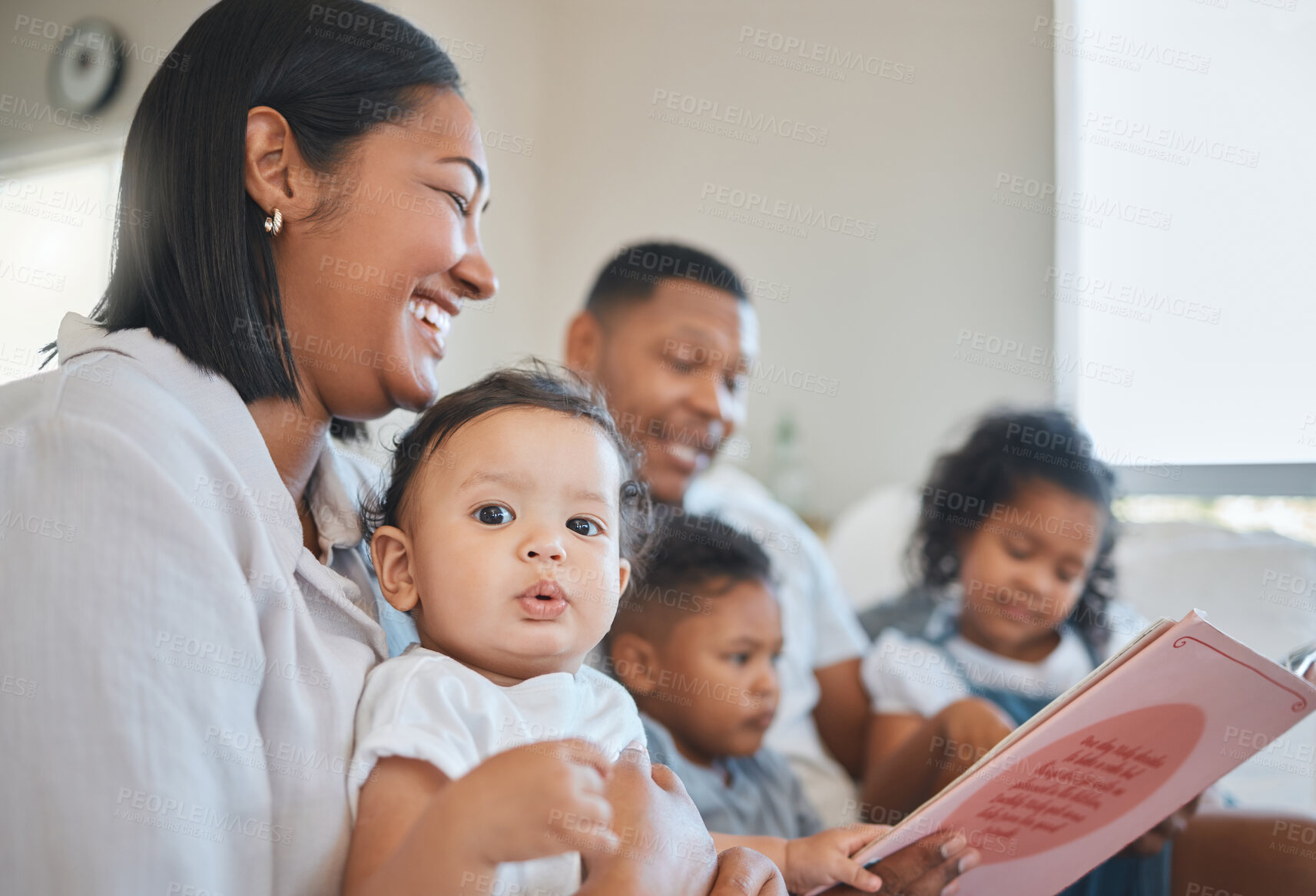 Buy stock photo Reading, books and parents with kids on sofa for bonding, development and relax together on weekend. Happy family, baby and mom, dad and children in living room for story, fairytale and novel in home