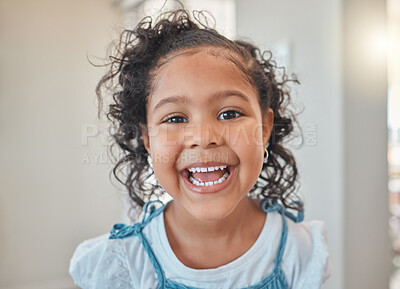 Buy stock photo Shot of a happy little girl at home