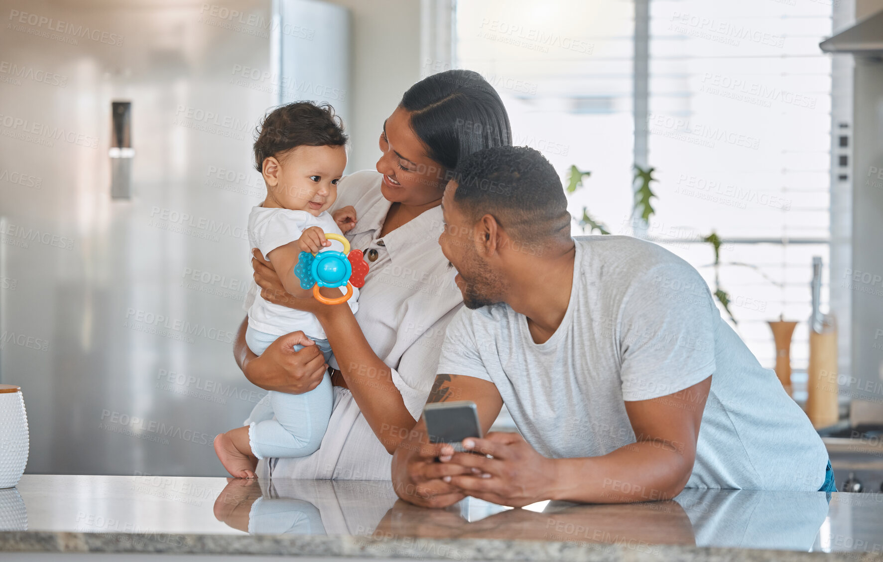 Buy stock photo Mom, dad and baby kitchen playing with love, growth and child development in happy family home. Father, mother and kid relax with support, toys and playful fun for weekend bonding together in morning