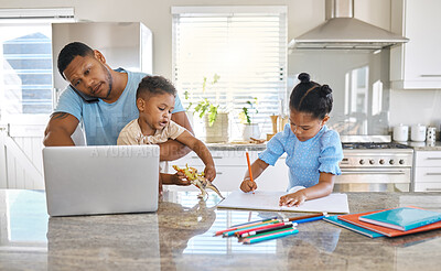Buy stock photo Shot of a young father working while looking after hi children at home