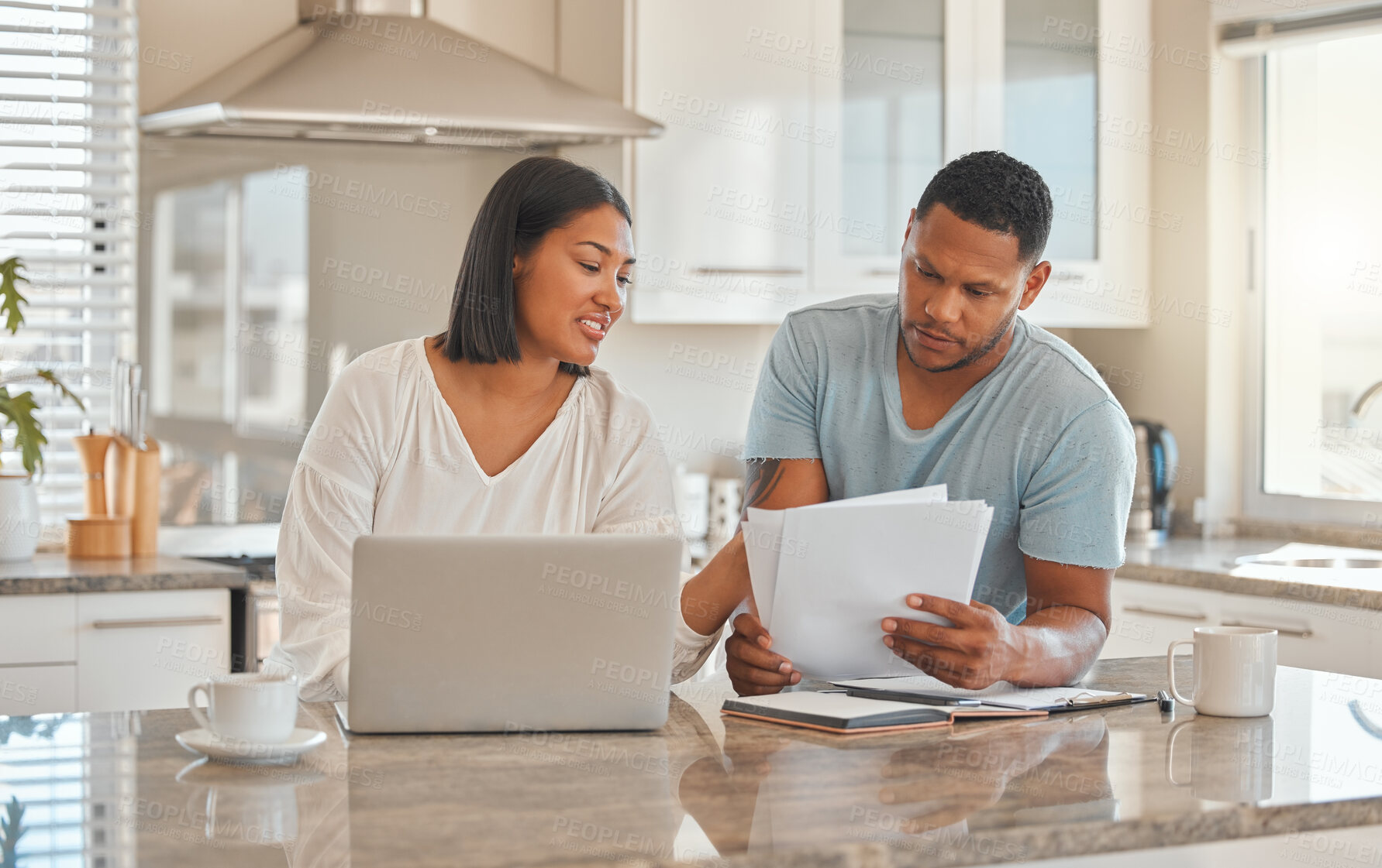 Buy stock photo Couple, laptop and paper in home for discussion, online banking and travel budget. Man, woman or document in kitchen with tech, invoice payment or explain contract for property investment opportunity