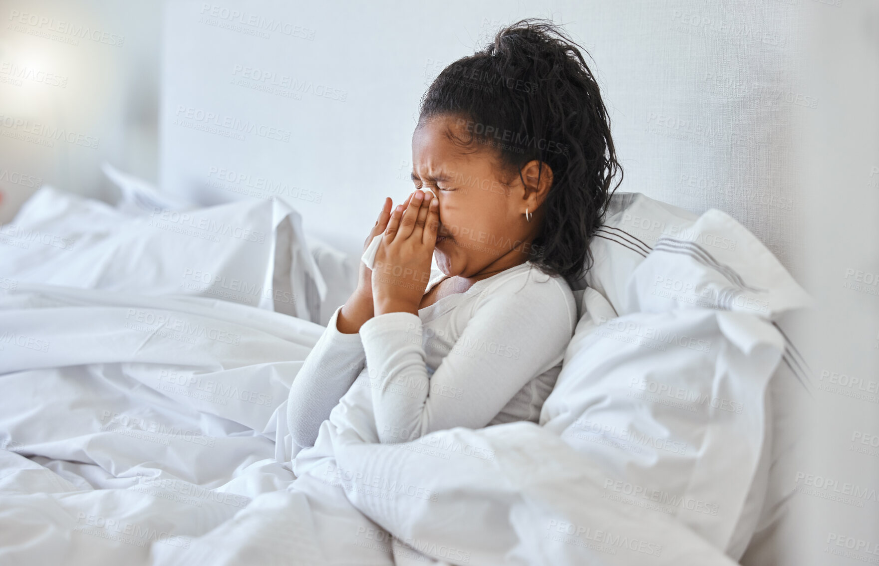 Buy stock photo Sick, child and blowing nose on bed with tissue for allergy problem, medical virus and influenza bacteria. Girl, sneeze and relax with toilet paper for recovery, hayfever and wellness risk at house