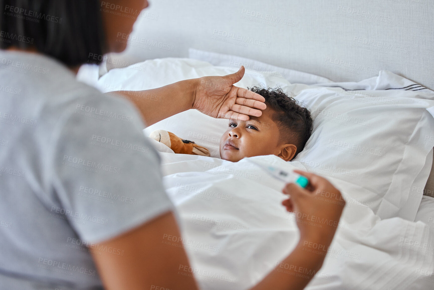 Buy stock photo Mother, temperature and sick child with fever, thermometer and medical problem of virus infection in bedroom. Woman, check and forehead with tool to monitor recovery, bacteria risk and worry at house