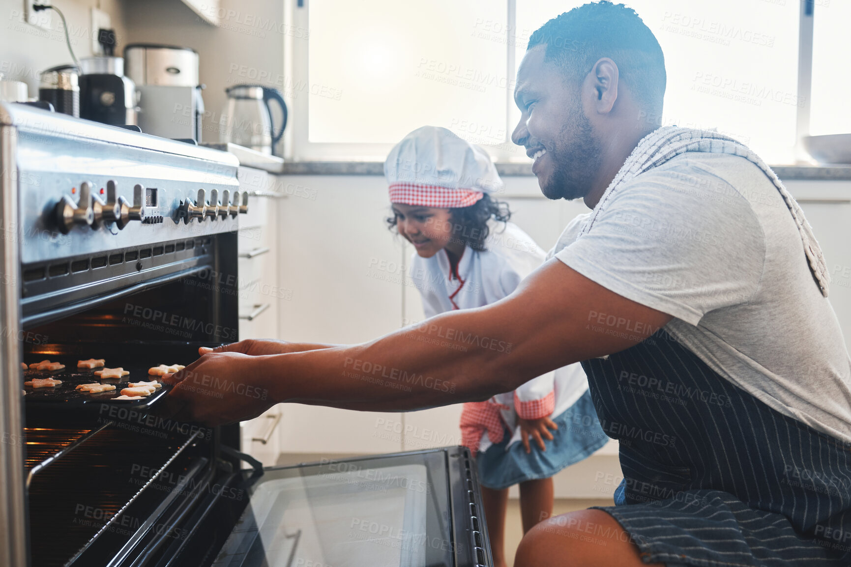 Buy stock photo Baking, child and dad in kitchen, oven and growth of daughter, development and learning in house and smile. Cookies, preparation and kid with man, teaching and helping for dessert, bonding and home