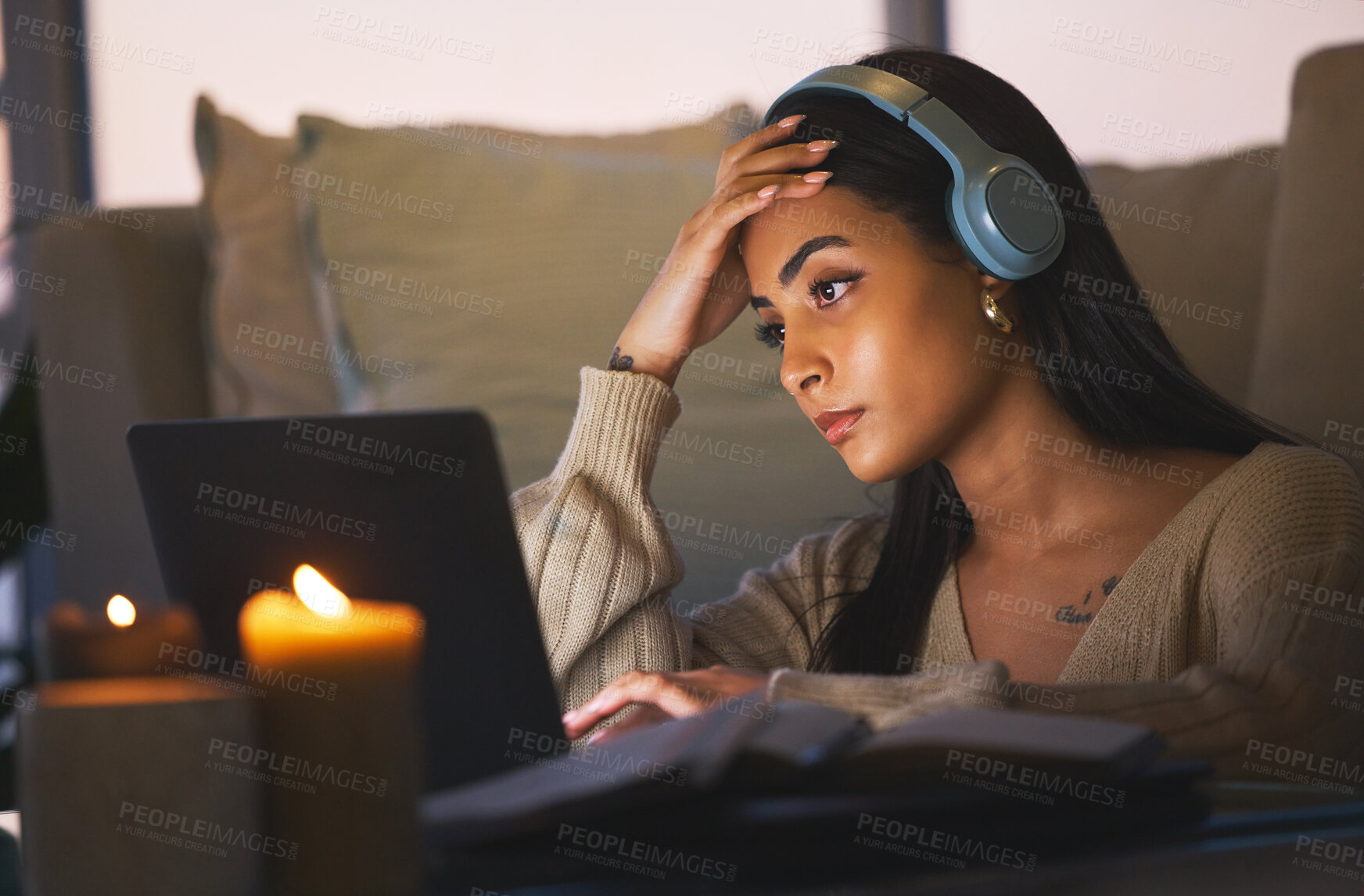 Buy stock photo Remote work, anxiety and woman with laptop at night for overtime, mistake or research in living room. Home, headphones and overwhelmed freelancer with stress for project deadline, fatigue and burnout