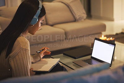 Buy stock photo Laptop screen, online course and woman on sofa with headphones, books and university project at night. Elearning education, research and college student with computer, website and studying at home