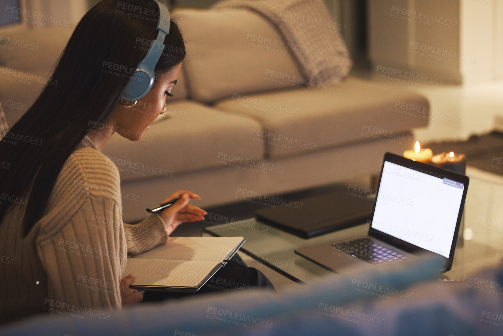 Buy stock photo Laptop screen, online course and woman on sofa with headphones, books and university project at night. Elearning education, research and college student with computer, website and studying at home