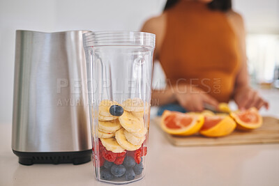 Buy stock photo Fruit, smoothie and closeup with woman and blender in kitchen for gut health, diet and breakfast. Wellness, detox and nutrition with female person at home for cooking, juice and weight loss milkshake