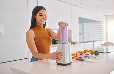 Buy stock photo Woman, blender and breakfast smoothie in home, cooking and fruit for mineral liquid in kitchen. Female person, vitamin shake and electronic appliance for vegan nutrition, weight loss and detox diet