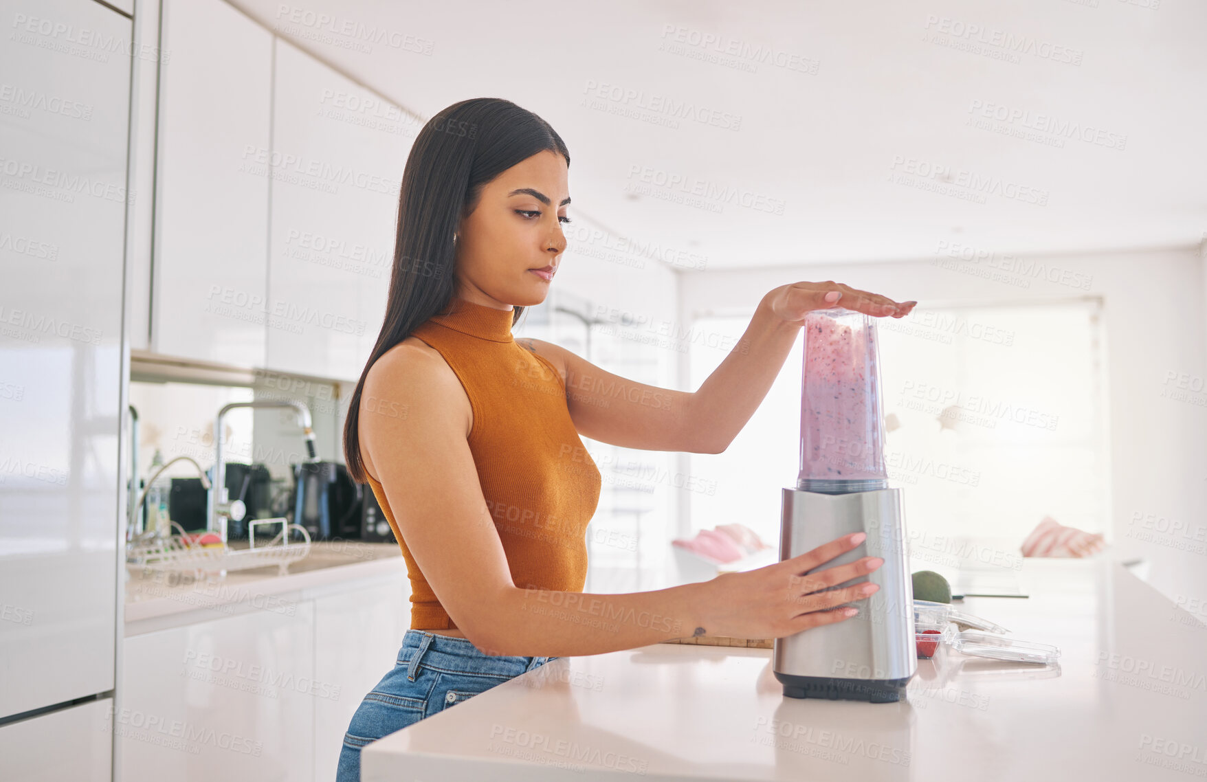 Buy stock photo Woman, blender and prepare smoothie in home, cooking and fruit for mineral liquid in kitchen. Female person, vitamin shake and electronic equipment for nutrition, breakfast cocktail and detox diet