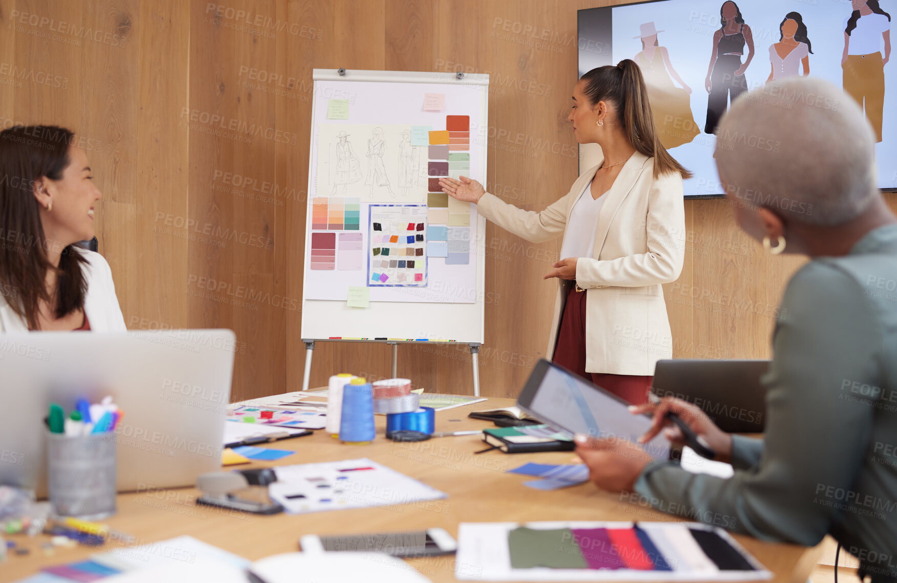 Buy stock photo Shot of a group of female designers working in an office