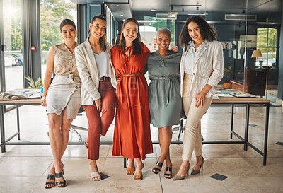 Buy stock photo Shot of a group of female designers standing in an office