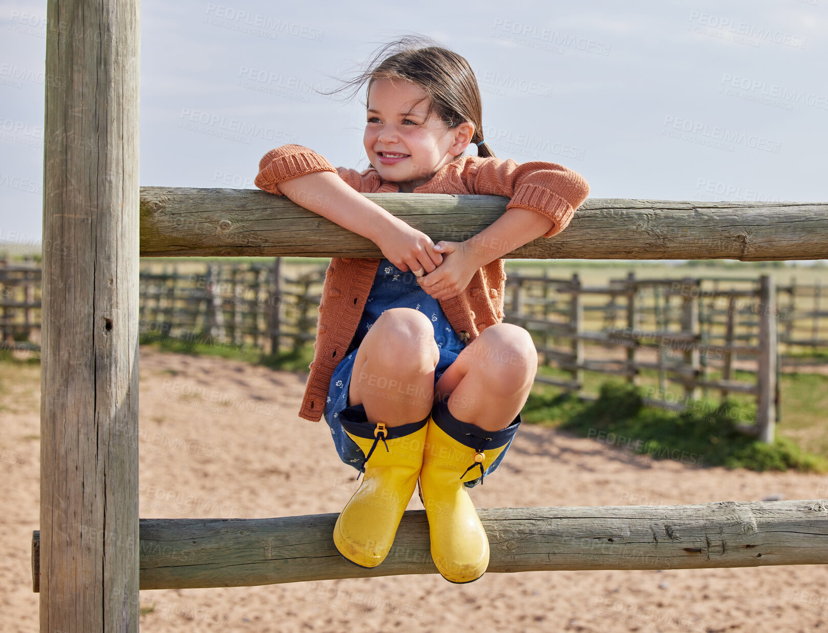 Buy stock photo Agriculture, smile and thinking with girl on farm for development, growth or sustainability. Children, future and idea with happy kid playing on fence or gate in countryside for fun or games