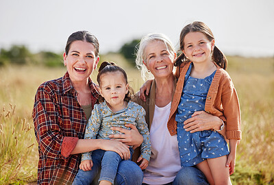 Buy stock photo Shot of two little girls on a farm with their mother and grandmother
