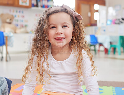 Buy stock photo Shot of an adorable little girl sitting in class