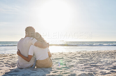 Buy stock photo Full length shot of an affectionate young couple sharing an intimate moment at the beach