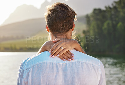 Buy stock photo Engagement, hug and couple by lake for romantic holiday, vacation and honeymoon in nature together. Love, proposal mockup and hands of woman holding man for embrace, hugging and affection outdoors