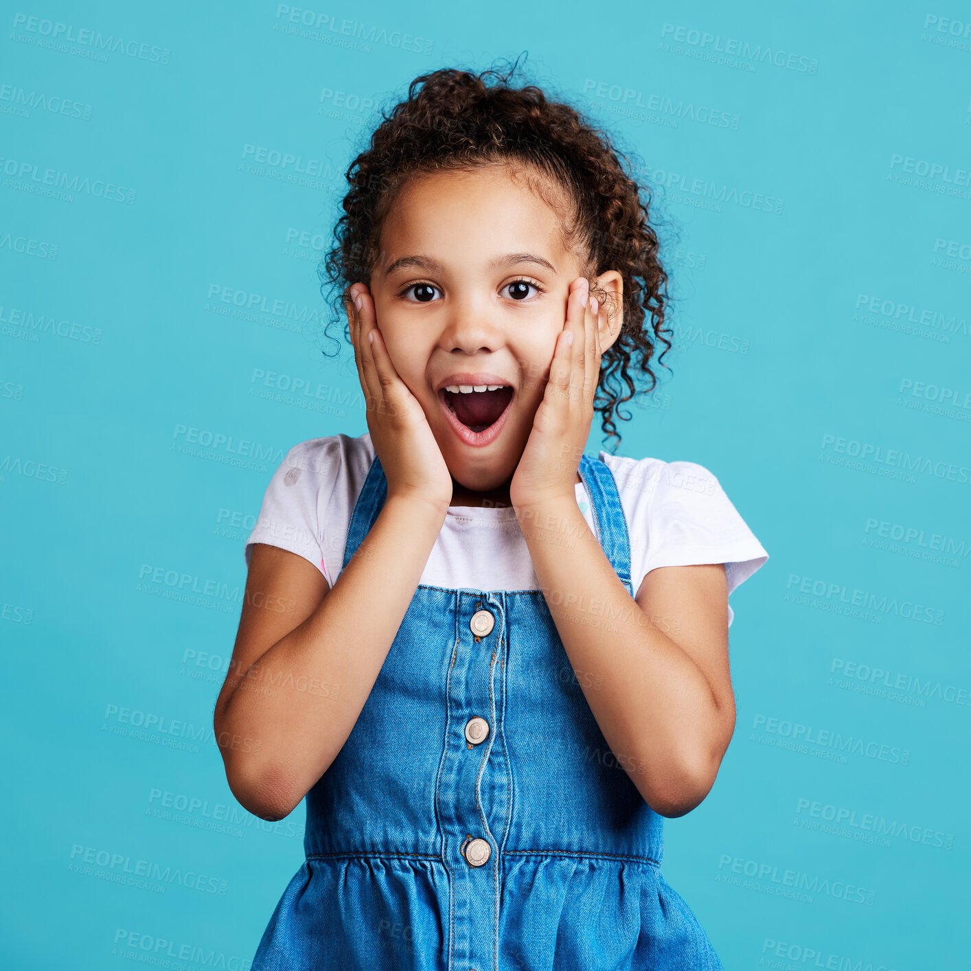 Buy stock photo Portrait, surprise and girl with smile, wow and cheerful against a blue studio background. Face, female child and young person with shock, facial expression and gasp with joy, happiness and emoji