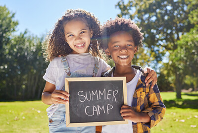 Buy stock photo Summer camp sign, portrait or happy kids hug in park together for fun, bonding or playing in outdoors. Board, diversity or young best friends smiling or embracing on school holidays outside in nature