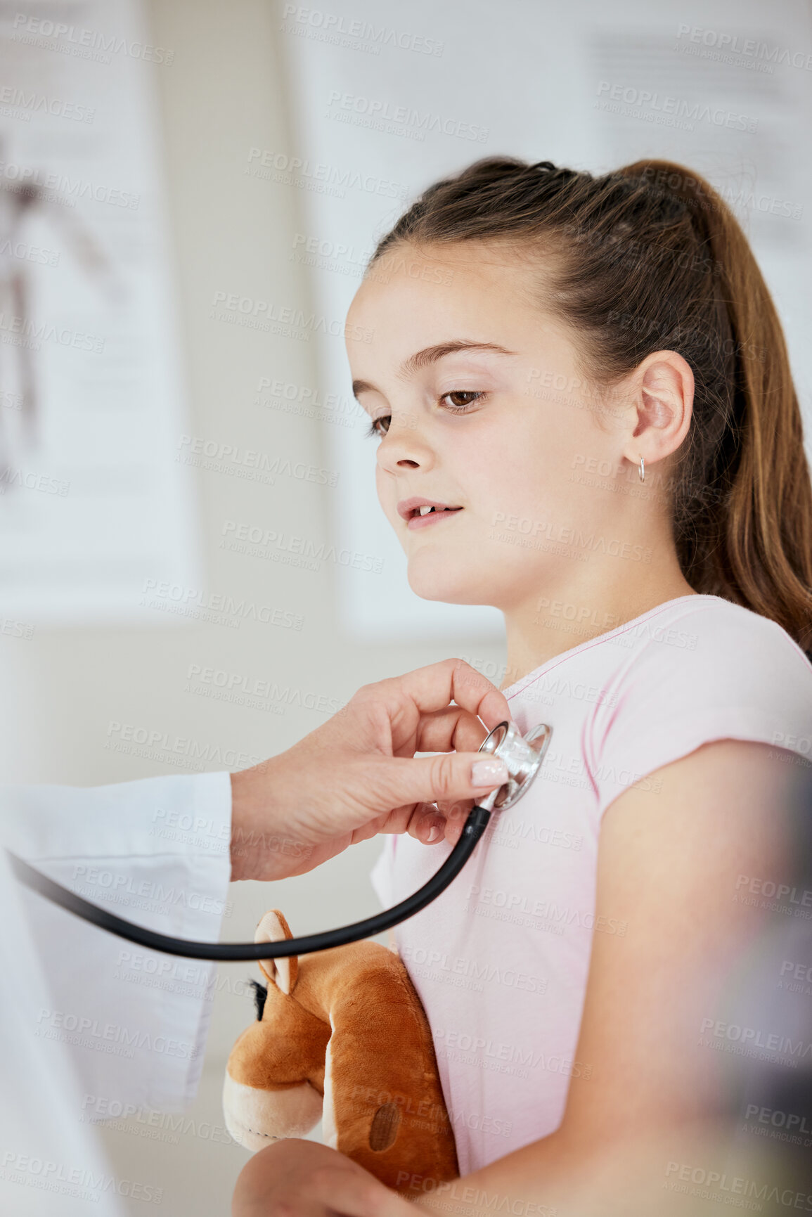 Buy stock photo Pediatrician, girl and serious with stethoscope for heartbeat or rate on consultation and appointment. People, doctor and worried kid as patient at hospital for healthcare support, trust and care