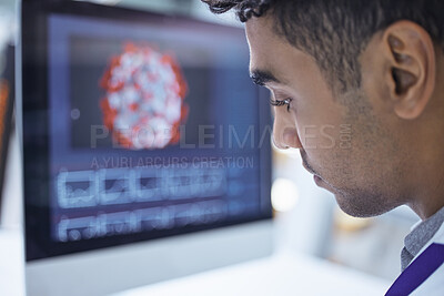 Buy stock photo Shot of a male lab tech working at his desk