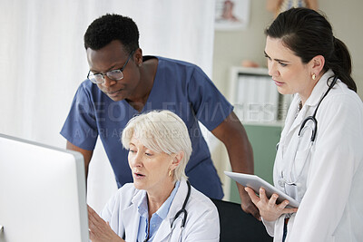 Buy stock photo Shot of a senior doctor giving her staff members training
