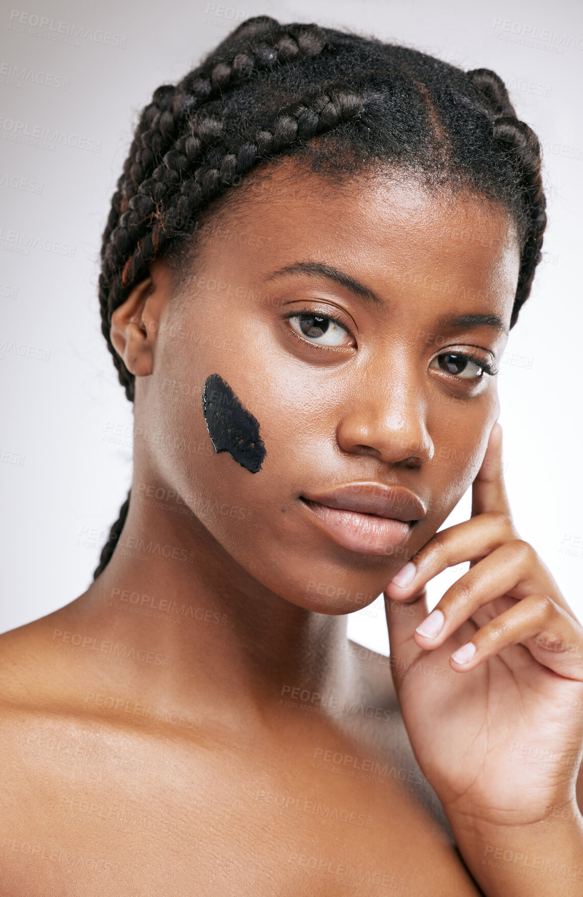 Buy stock photo Charcoal, skincare and mask with portrait of black woman in studio for cosmetics, beauty and detox facial. Self care, glow and shine with model on white background for clean, dermatology and spa