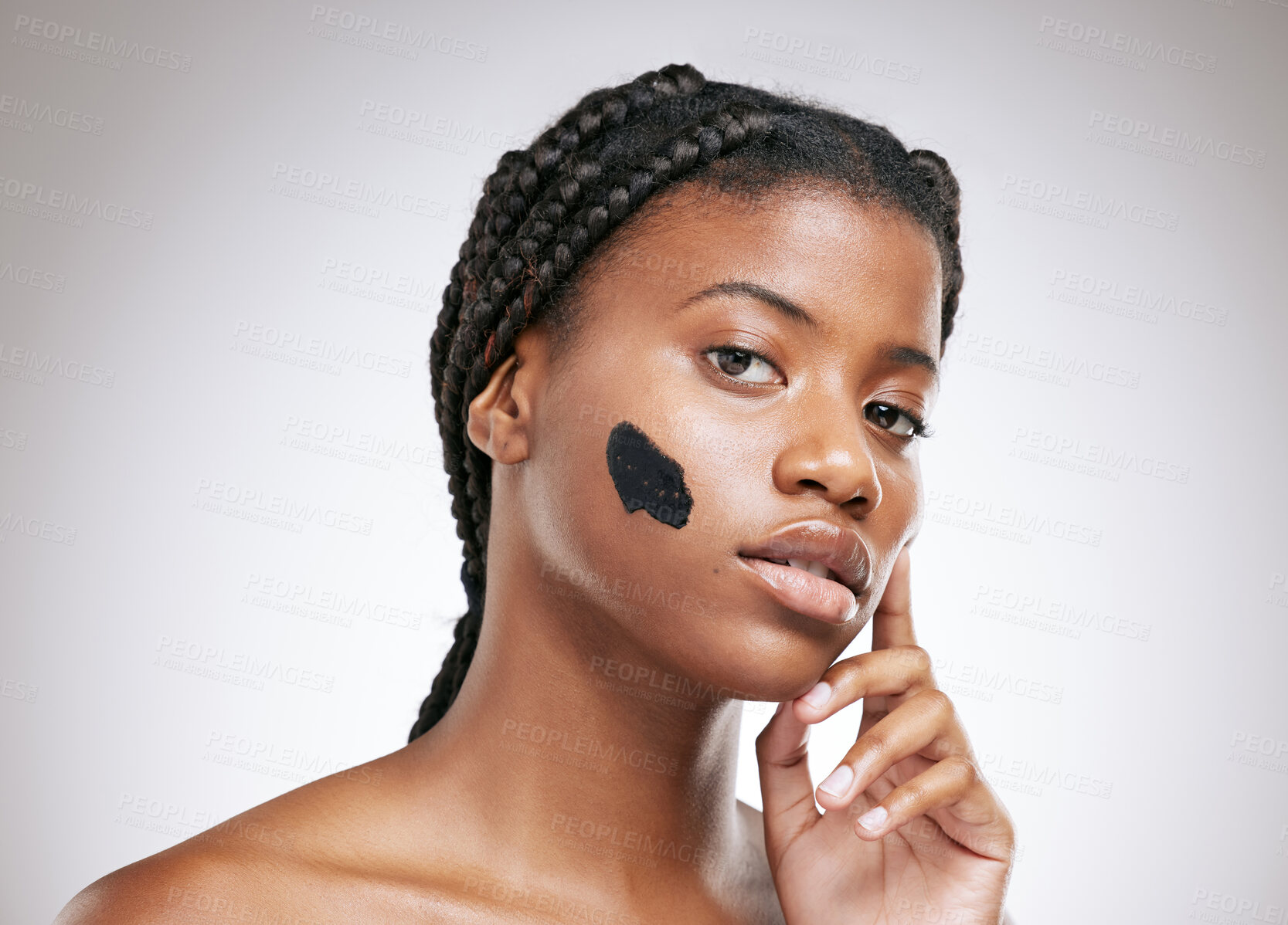 Buy stock photo Beauty, skincare and mask with portrait of black woman in studio for cosmetics, charcoal and detox facial. Self care, glow and shine with model on white background for clean, dermatology and spa