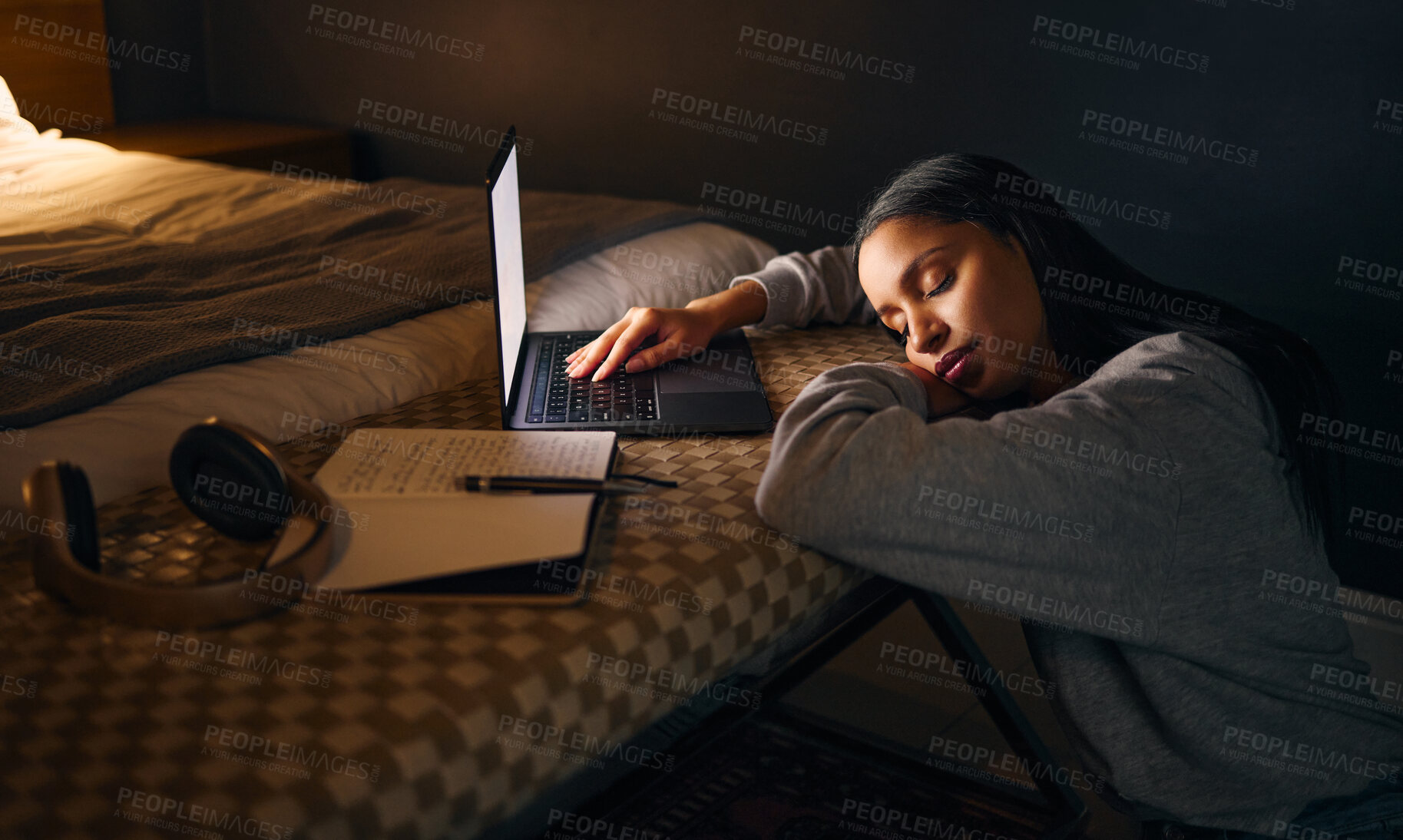 Buy stock photo Woman, laptop and sleeping at night for study, learning and university in home on bed with online course. Student, technology and burnout in apartment for college exam, education and research project