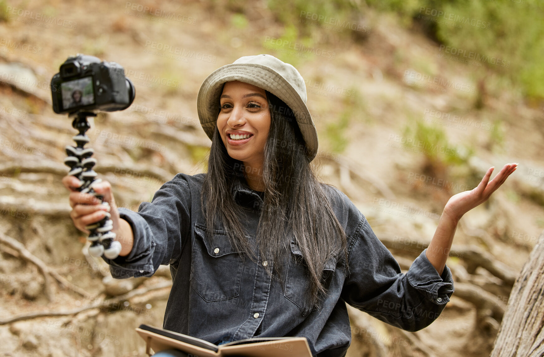 Buy stock photo Woman, outdoor and selfie in nature, hiking and forest for travel influencer on vlog. Female person, trekking and trip to ecosystem, live streaming and talking to online audience on climate change