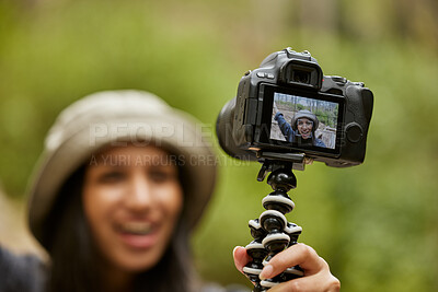 Buy stock photo Woman, selfie and camera screen in nature, hiking and forest for travel journalism. Female person, trekking and capture memory of jungle ecosystem, sightseeing tourism and photography in Indonesia