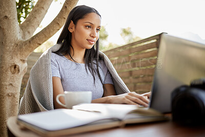 Buy stock photo Remote work, woman and laptop on patio for research, creative writing or editing blog at lodge. Nature photographer, productivity or tech on cabin deck for planning, schedule or online travel journal