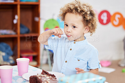 Buy stock photo Boy, eating and cake in classroom, party and celebration for birthday with meal at kindergarten. African kid, plate and snack with dessert, sweets and food for memory with event, creche and school