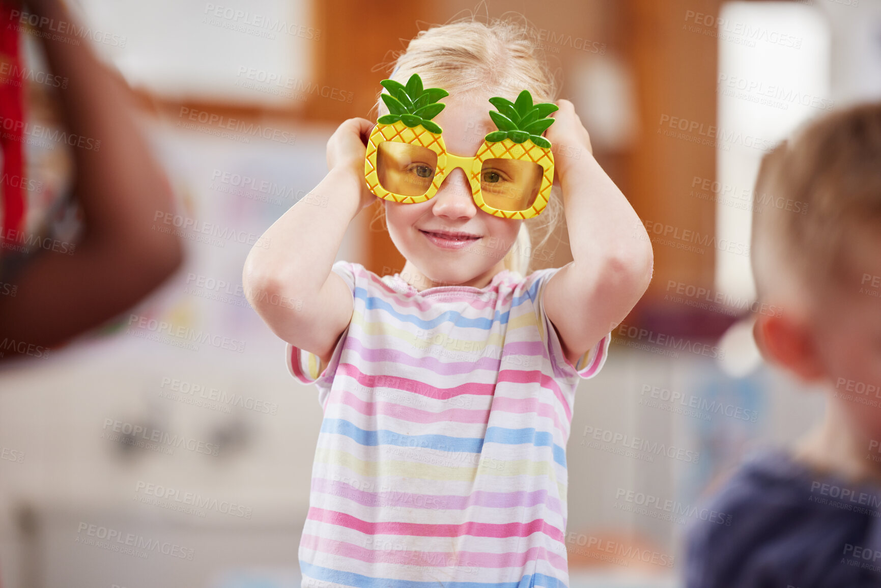 Buy stock photo Shot of a little girl wearing funky glasses in class