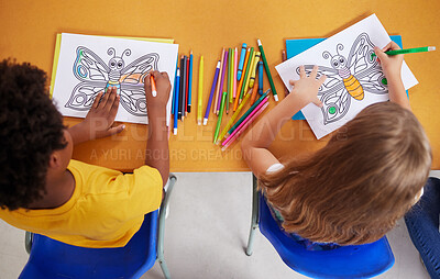 Buy stock photo Shot of preschool students colouring in class