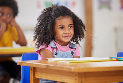 Buy stock photo Shot of an adorable little girl in class