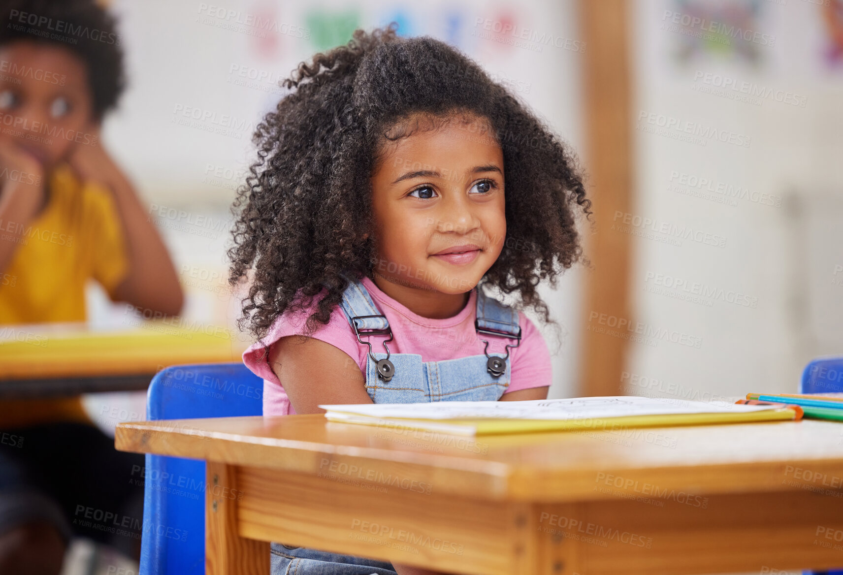 Buy stock photo Shot of an adorable little girl in class