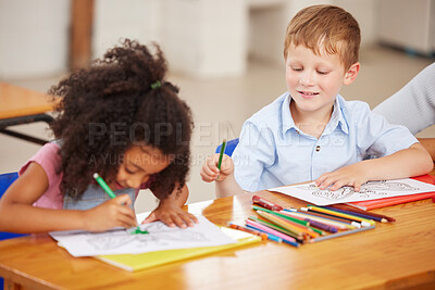 Buy stock photo Shot of preschool students colouring in class