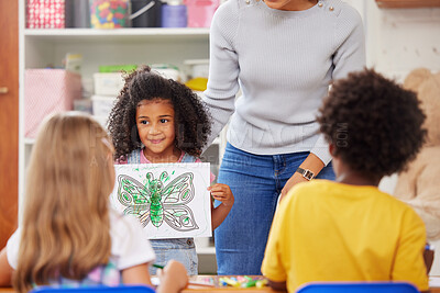 Buy stock photo Shot of a preschooler showing the class her artwork
